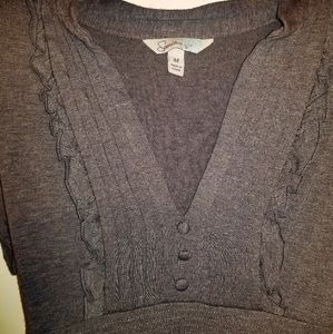 Ruffles and bows in this sweet cotton dress